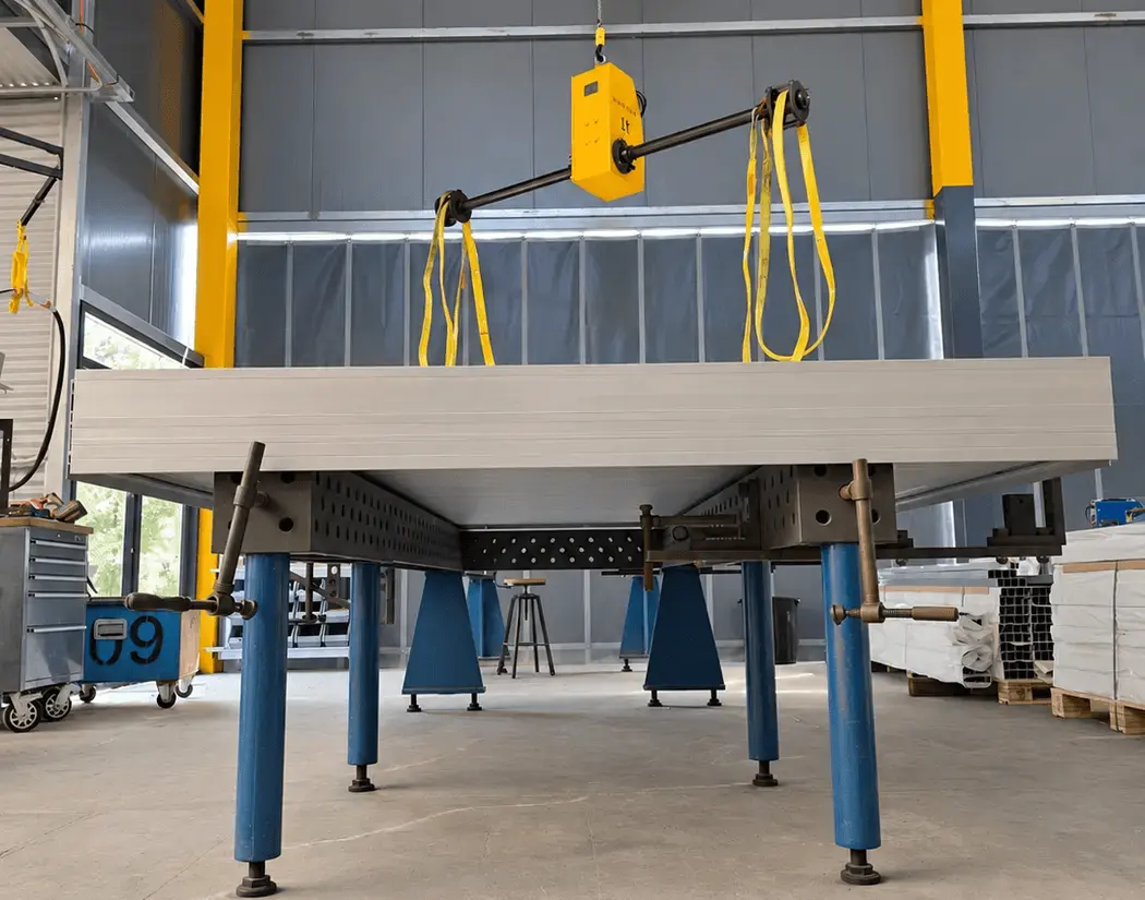 Truck-body floor supported on a manufacturing fixture